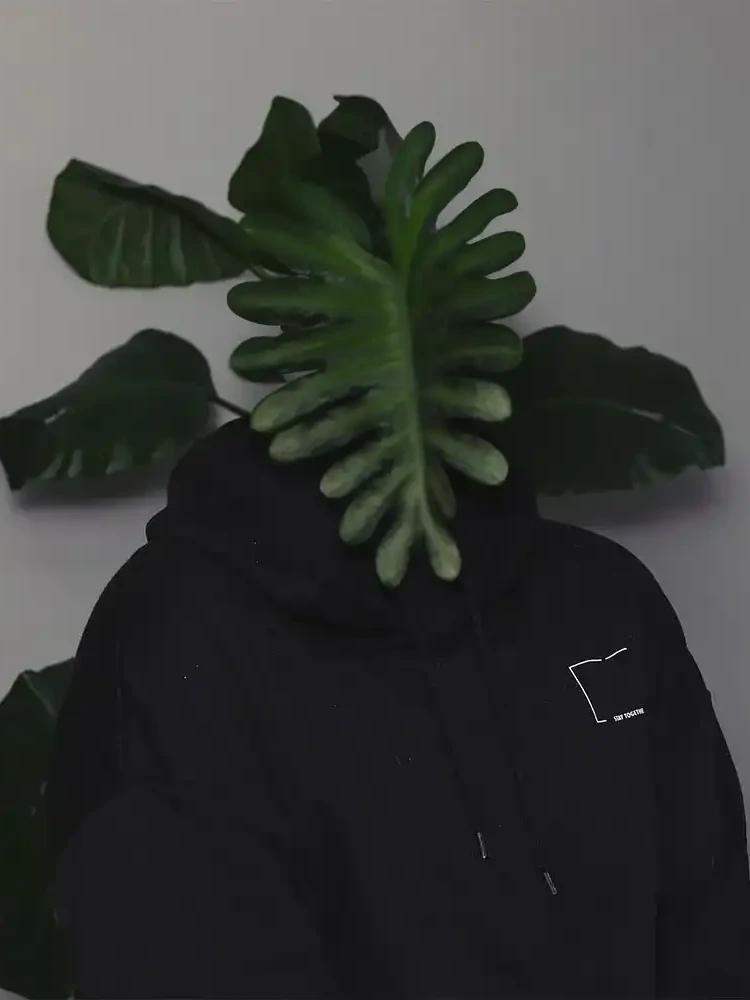 A man with a plant for a face